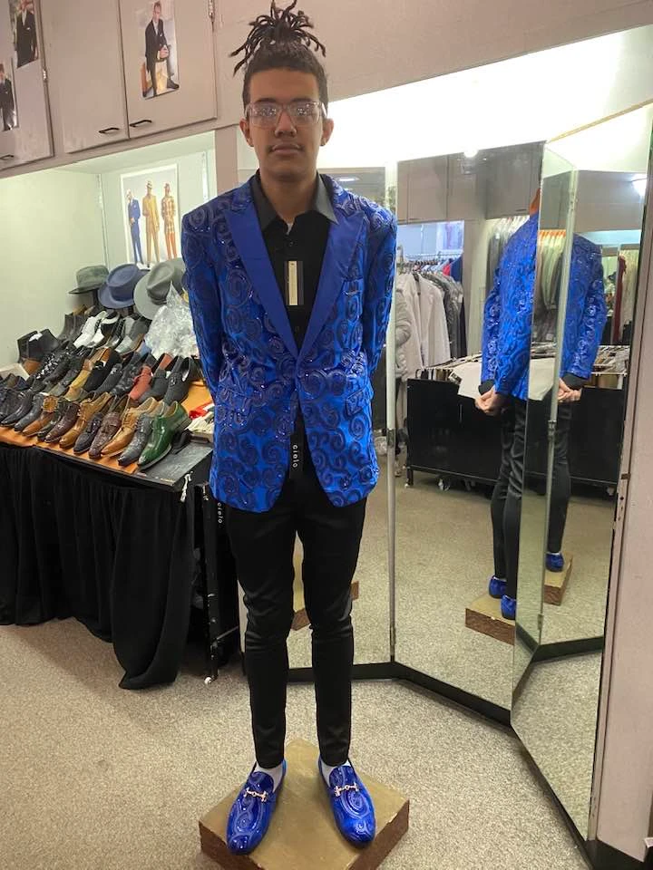 Client wearing royal blue swirl pattern blazer with matching loafers
