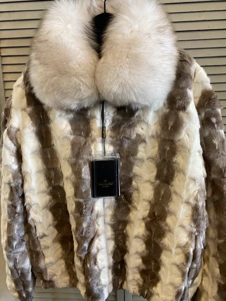 Cream and brown fur coat with white collar