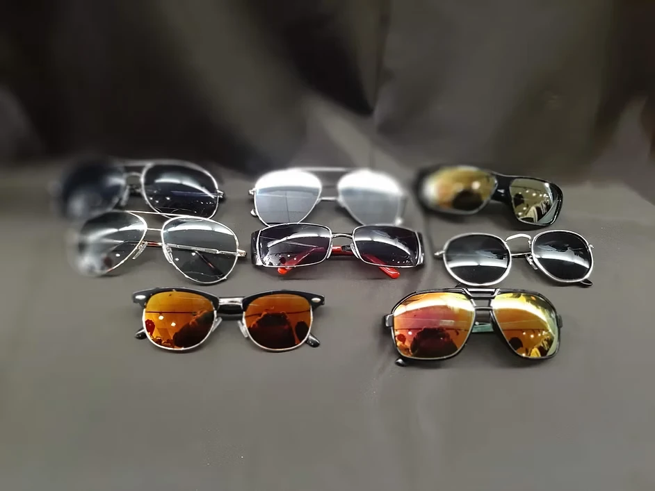 Collection of men's sunglasses in aviator and clubmaster styles