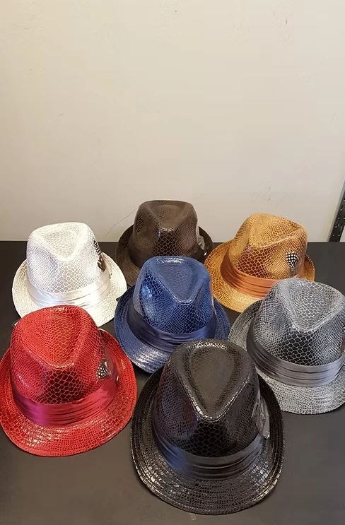 Collection of snakeskin fedora hats in red, white, blue, brown, gold, and grey