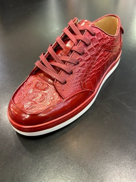 Red crocodile embossed leather sneaker