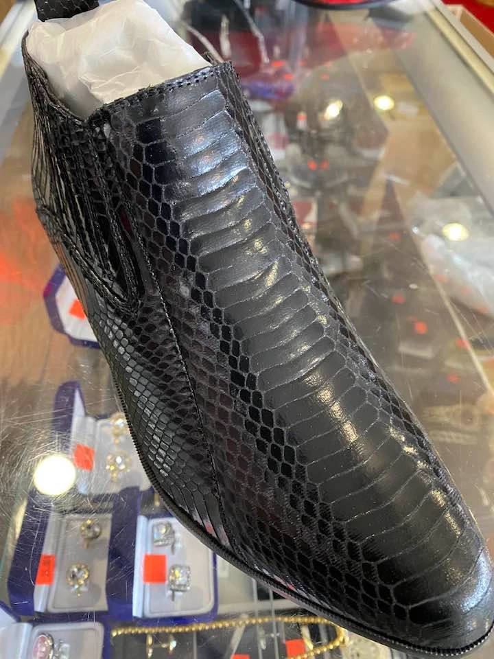 Black snakeskin dress boot