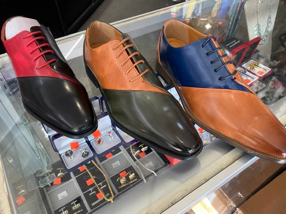 Two-tone oxford dress shoes in red, tan, and blue