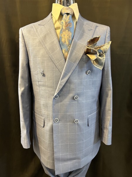 Light grey windowpane double-breasted men's suit with modern fit, patterned gold paisley tie and pocket square, available at Jack Green Men's Shop, 736 East Ridge Road, Rochester, NY